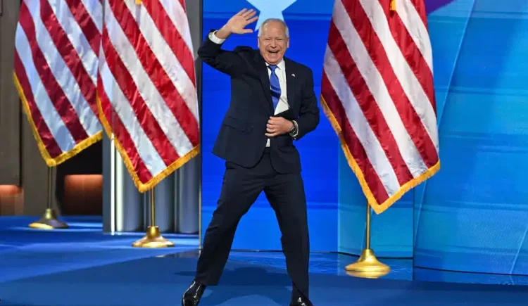 Minnesota Gov. Tim Walz taking the stage Wednesday in Chicago to accept the Democratic nomination for vice president. (Ricky Carioti/The Washington Post)